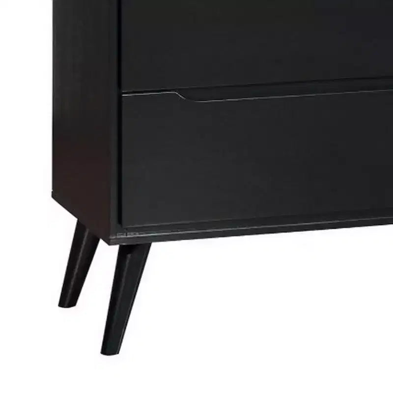 Commode 4 tiroirs en bois avec pieds ronds fuselés, noire